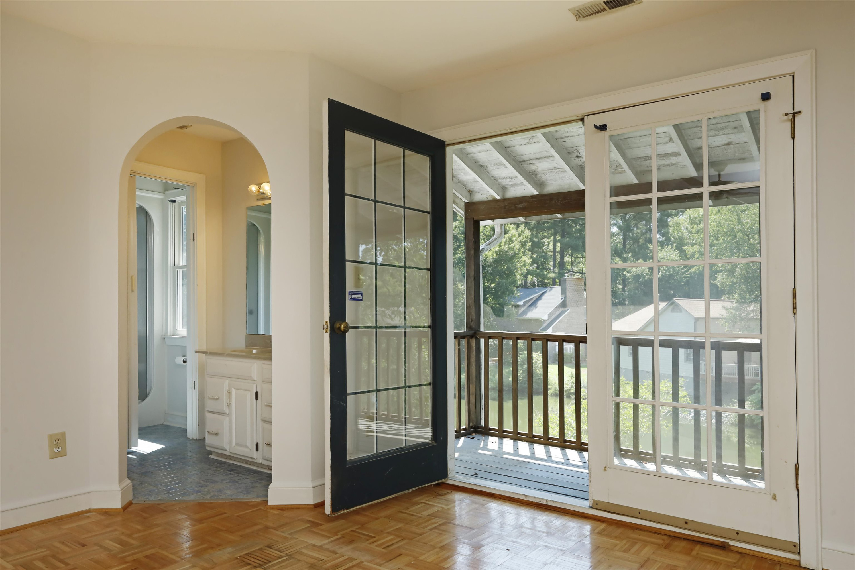130 Weatherhill Point Carrboro, NC 27510 - Photo 25 of 40 Looking out to screen porch and lake.