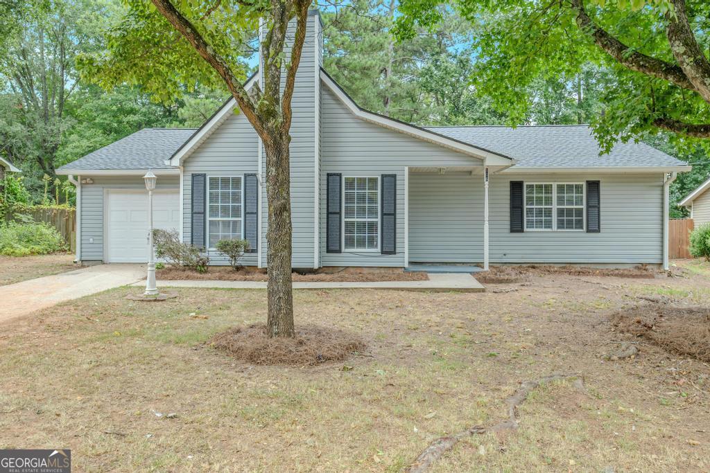 106 Clifford Court Stockbridge, GA 30281 - Photo 1 of 1 front view of a house and a yard