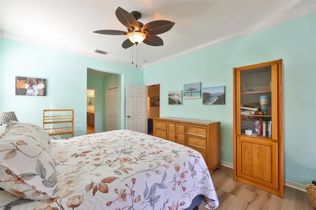 a spacious bathroom with a double vanity sink and a mirror