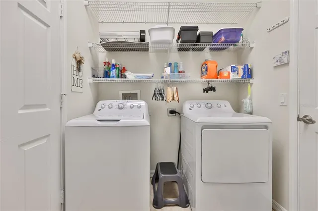 a front view of house with yard and swimming pool