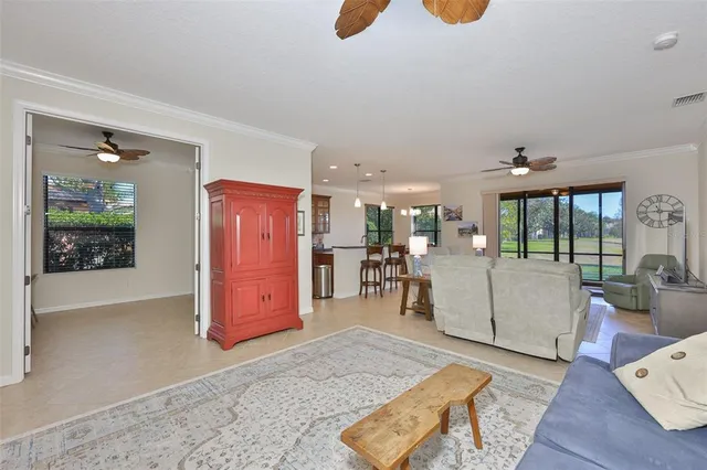 an aerial view of residential house with outdoor space and parking