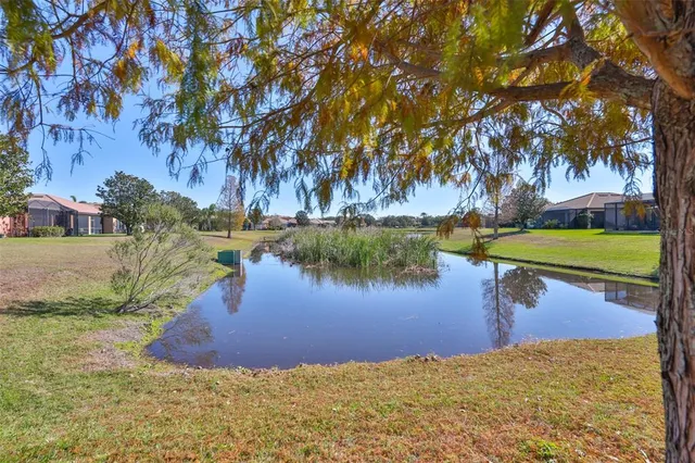 a view of swimming pool with outdoor seating