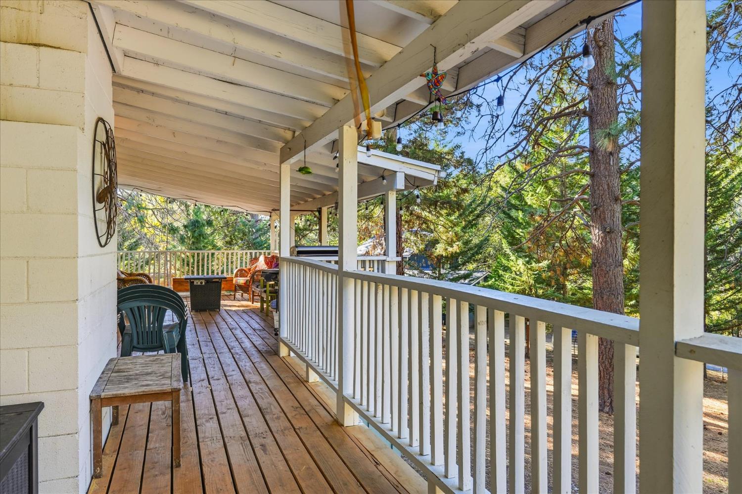 50740 Chu Ranch Road Oakhurst, CA 93644 - Photo 6 of 37 a view of a balcony with wooden floor