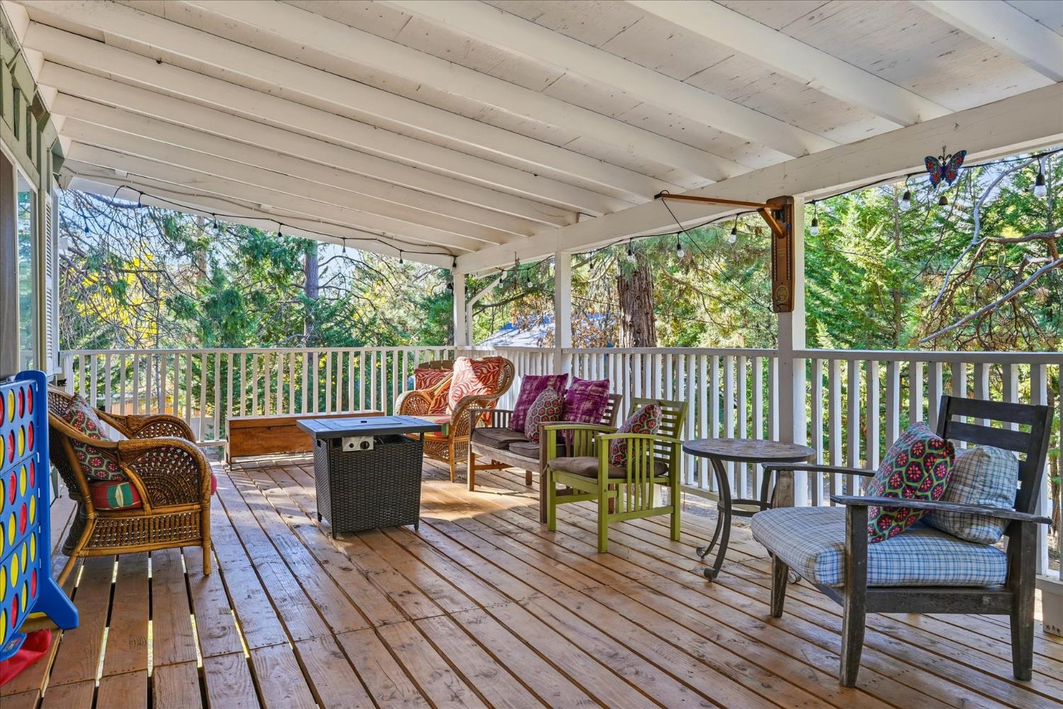 50740 Chu Ranch Road Oakhurst, CA 93644 - Photo 7 of 37 a view of a two chairs in the deck