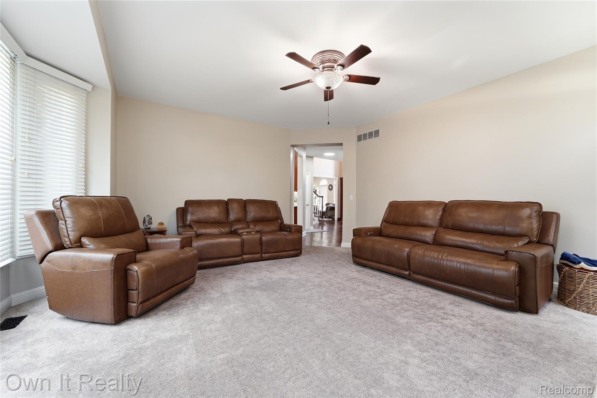 48280 Gladstone Road Canton, MI 48188 - Photo 25 of 59 Spacious room featuring light-toned walls, gray carpeting, and a bay window with blinds