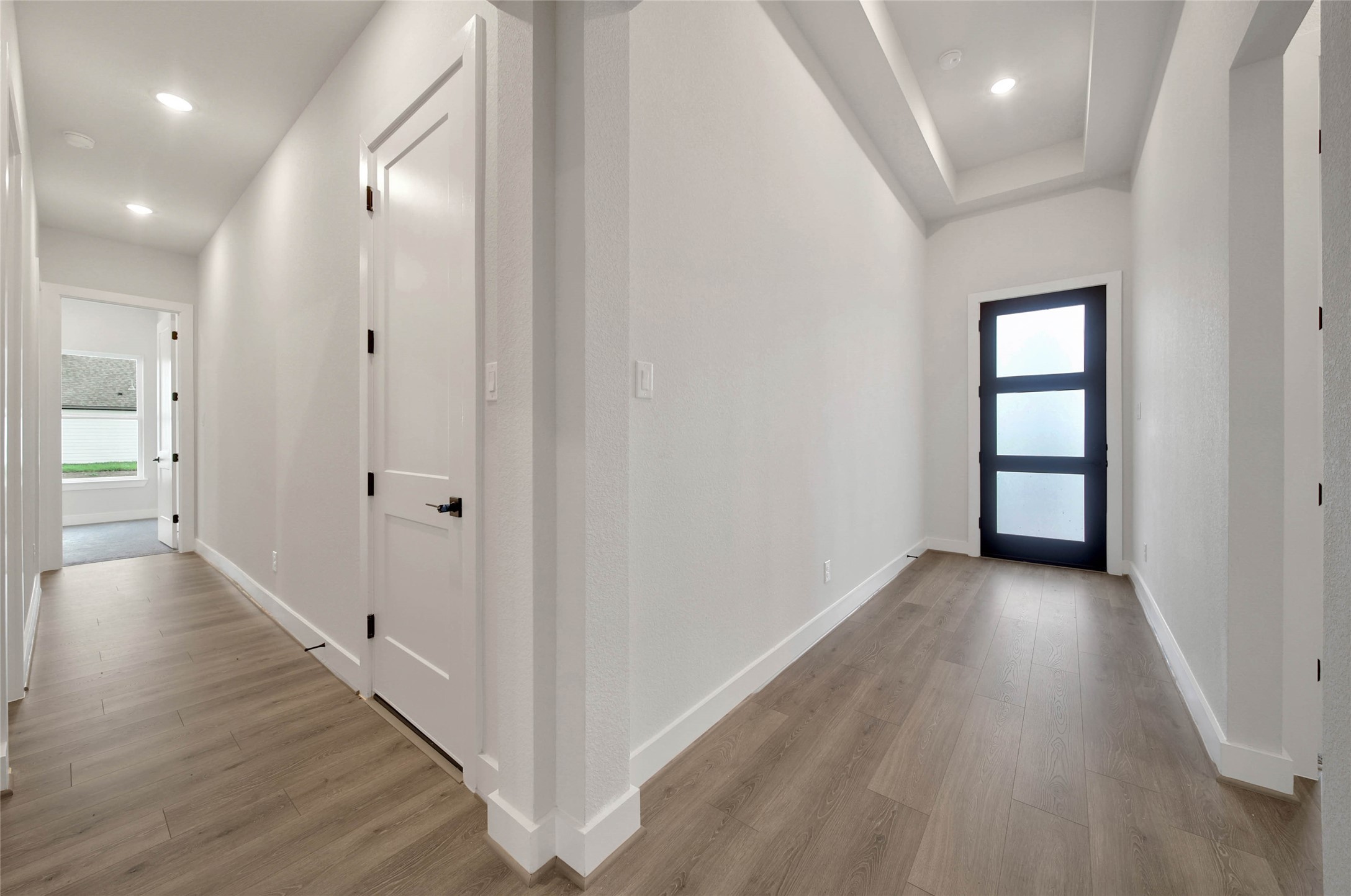 4610 Magnolia Bend Drive Rosharon, TX 77583 - Photo 3 of 48 a view of a hallway with wooden floor and closet