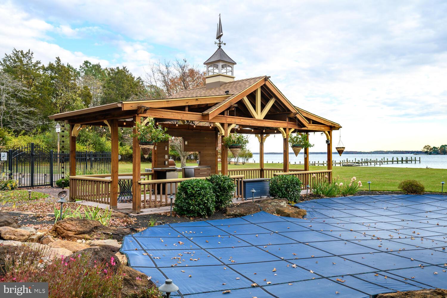 23961 Lynnewood Drive St. Michaels, MD 21663 - Photo 19 of 81 a front view of a house with garden