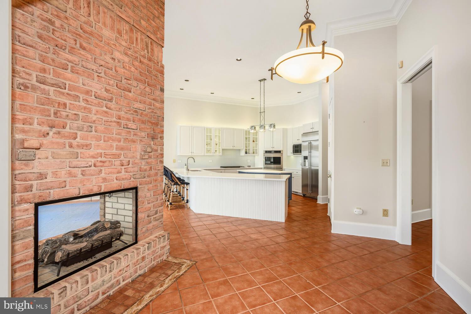 23961 Lynnewood Drive St. Michaels, MD 21663 - Photo 34 of 81 Breakfast area with double sided FP