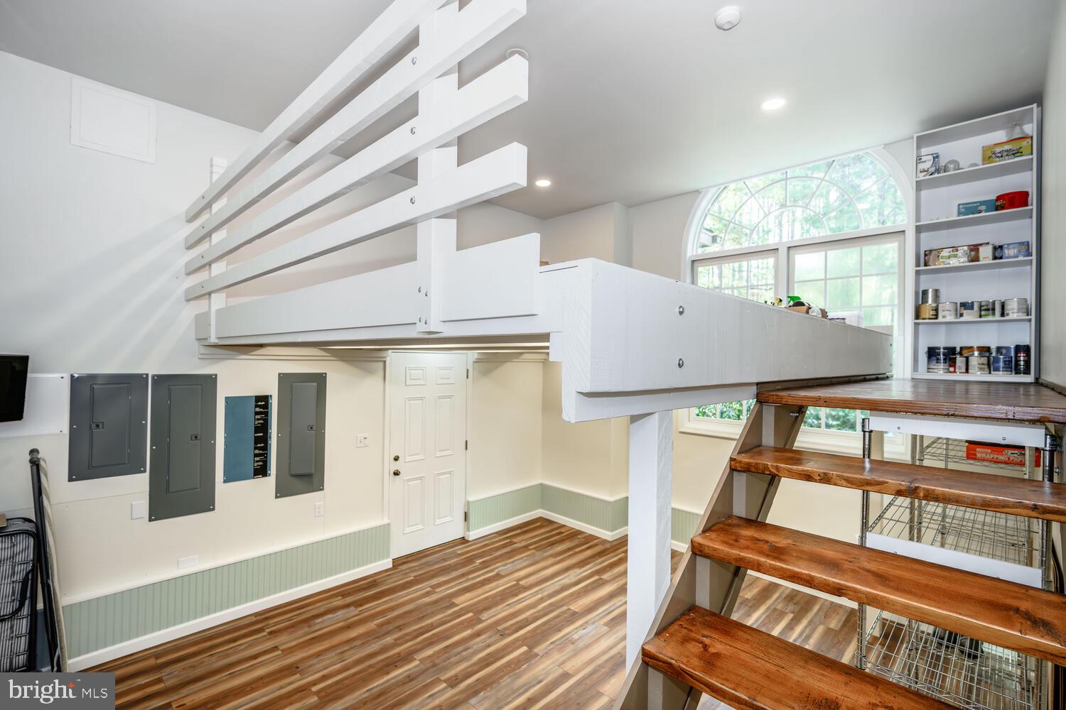 23961 Lynnewood Drive St. Michaels, MD 21663 - Photo 47 of 81 a view of a balcony with furniture and wooden floor