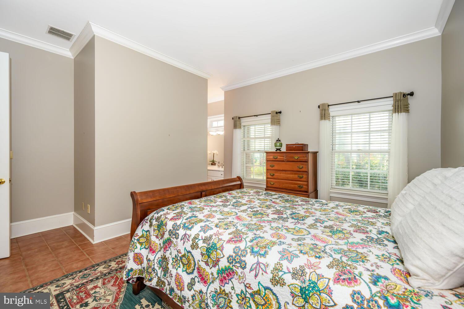 23961 Lynnewood Drive St. Michaels, MD 21663 - Photo 50 of 81 a bedroom with a bed and a window