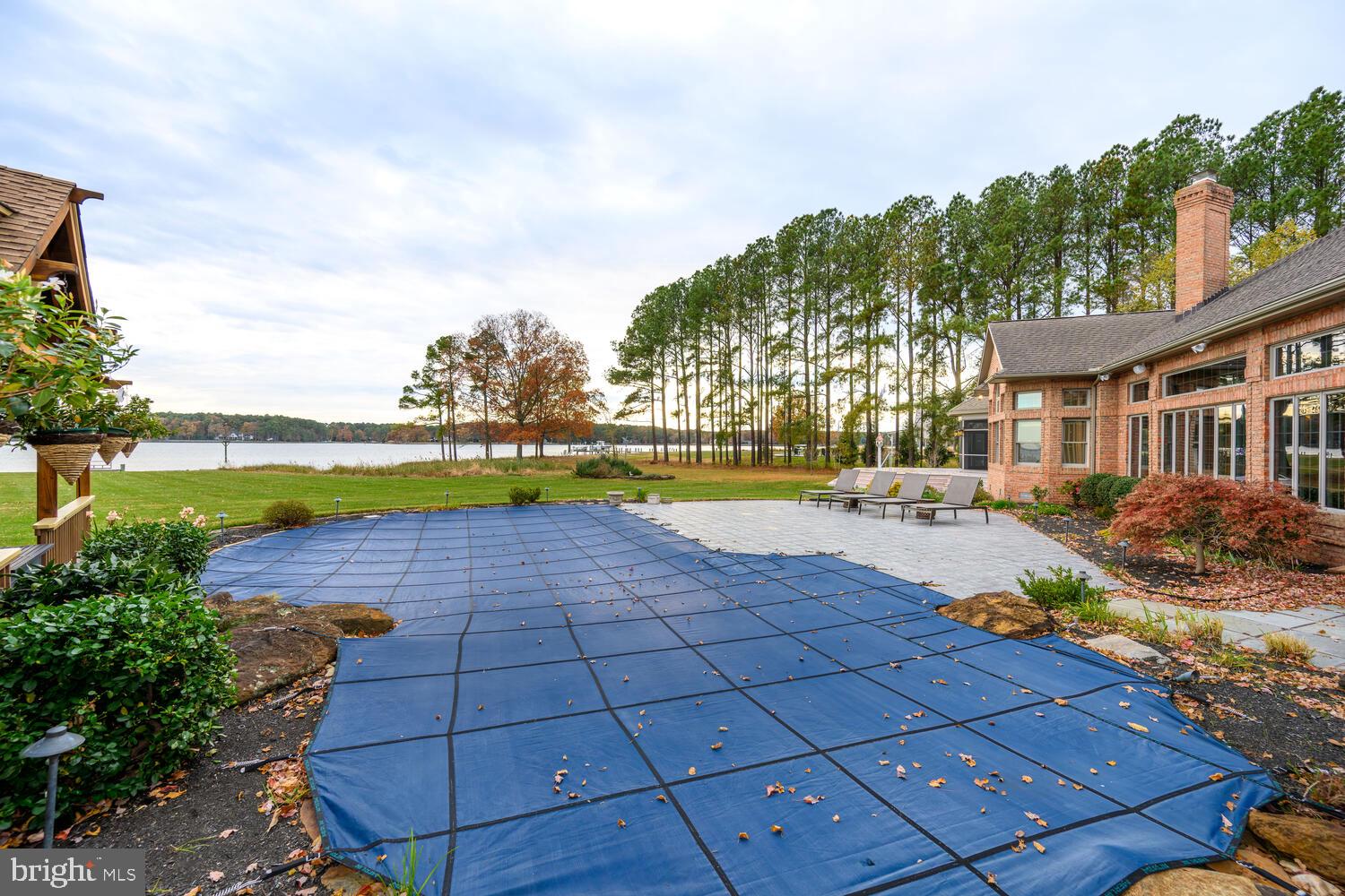 23961 Lynnewood Drive St. Michaels, MD 21663 - Photo 63 of 81 a view of swimming pool with outdoor space and lake view