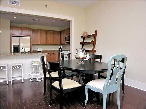 2046 Hwy Santa Rosa Beach, Unit M2321 30A Santa Rosa Beach, FL 32459 - Photo 3 of 14 a view of a dining room with furniture and wooden floor