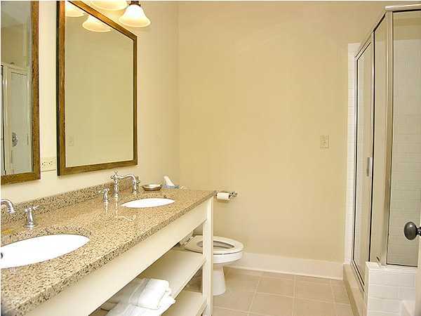 2046 Hwy Santa Rosa Beach, Unit M2321 30A Santa Rosa Beach, FL 32459 - Photo 5 of 14 a bathroom with a granite countertop sink and a mirror