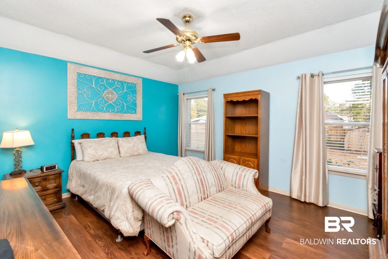9360 Burnt Tree Drive Mobile, AL 36695 - Photo 13 of 28 Bedroom featuring ceiling fan, dark hardwood / wood-style flooring, and a textured ceiling