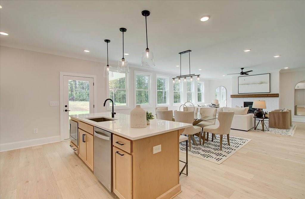 302 Evie Lane Canton, GA 30115 - Photo 22 of 45 a view of a kitchen counter space and breakfast area