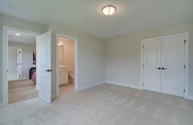 an empty room with a hallway