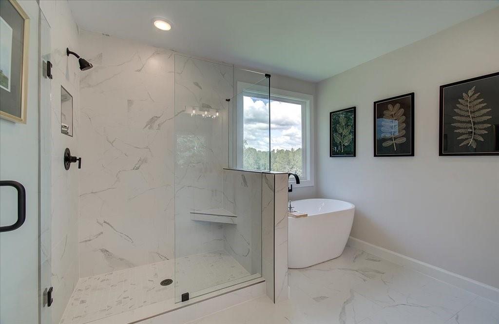 302 Evie Lane Canton, GA 30115 - Photo 38 of 45 a bathroom with a sink toilet and shower