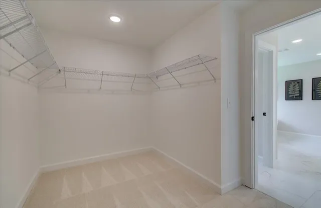 a view of a room with racks on the wall