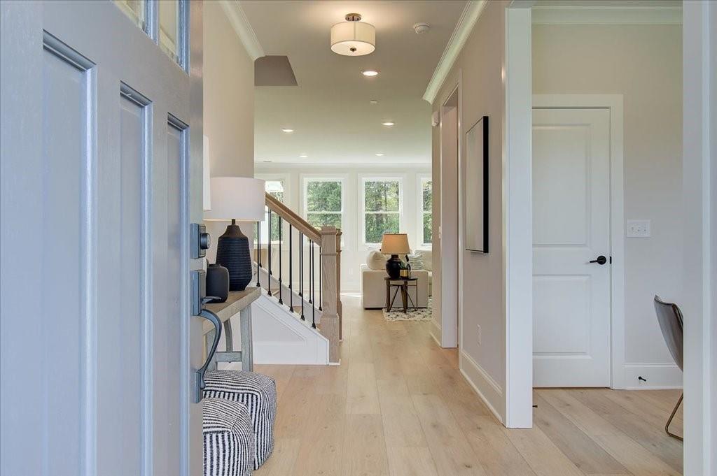 302 Evie Lane Canton, GA 30115 - Photo 7 of 45 a view of a livingroom with a furniture and entryway