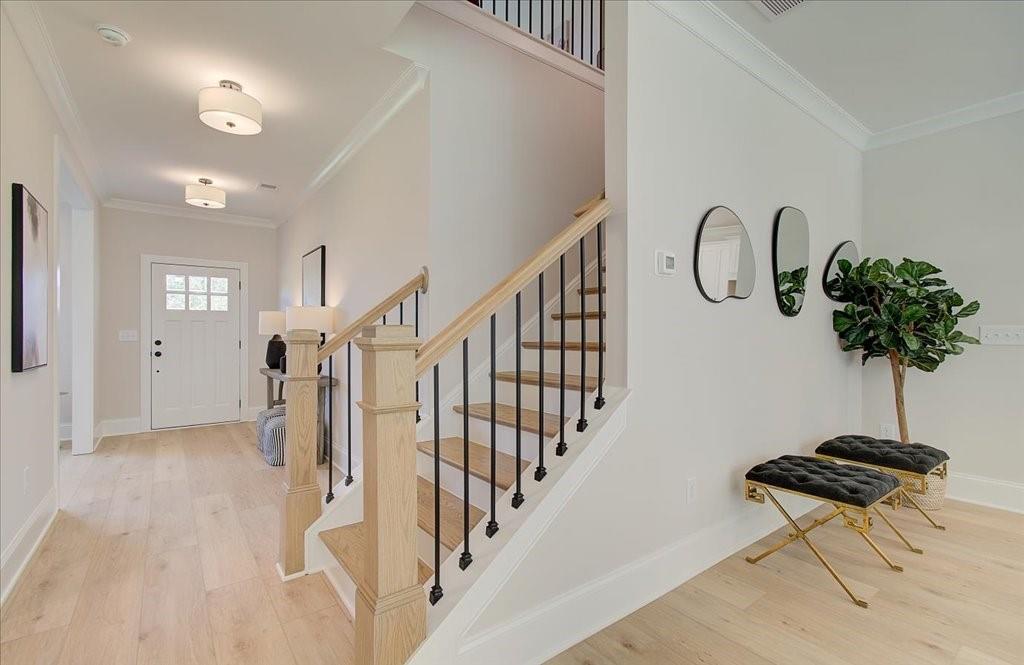 302 Evie Lane Canton, GA 30115 - Photo 10 of 45 a view of entryway with a table and a potted plant