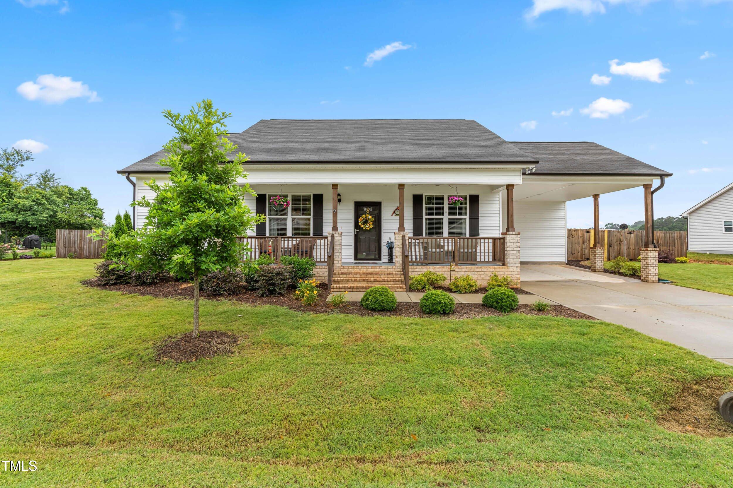 173 Longbow Drive Middlesex, NC 27557 - Photo 1 of 32 a view of a house with a swimming pool