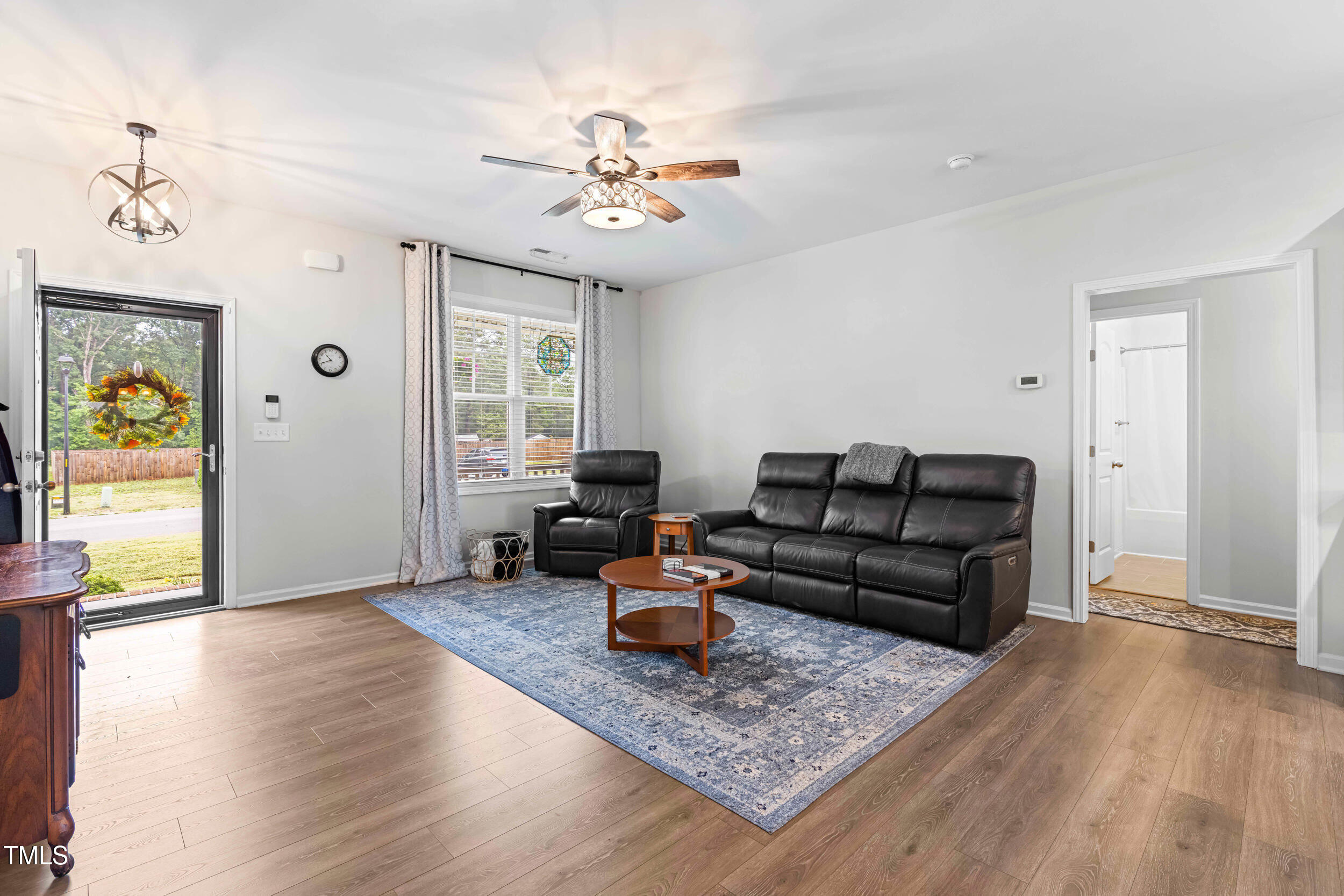 173 Longbow Drive Middlesex, NC 27557 - Photo 11 of 32 a living room with furniture and wooden floor