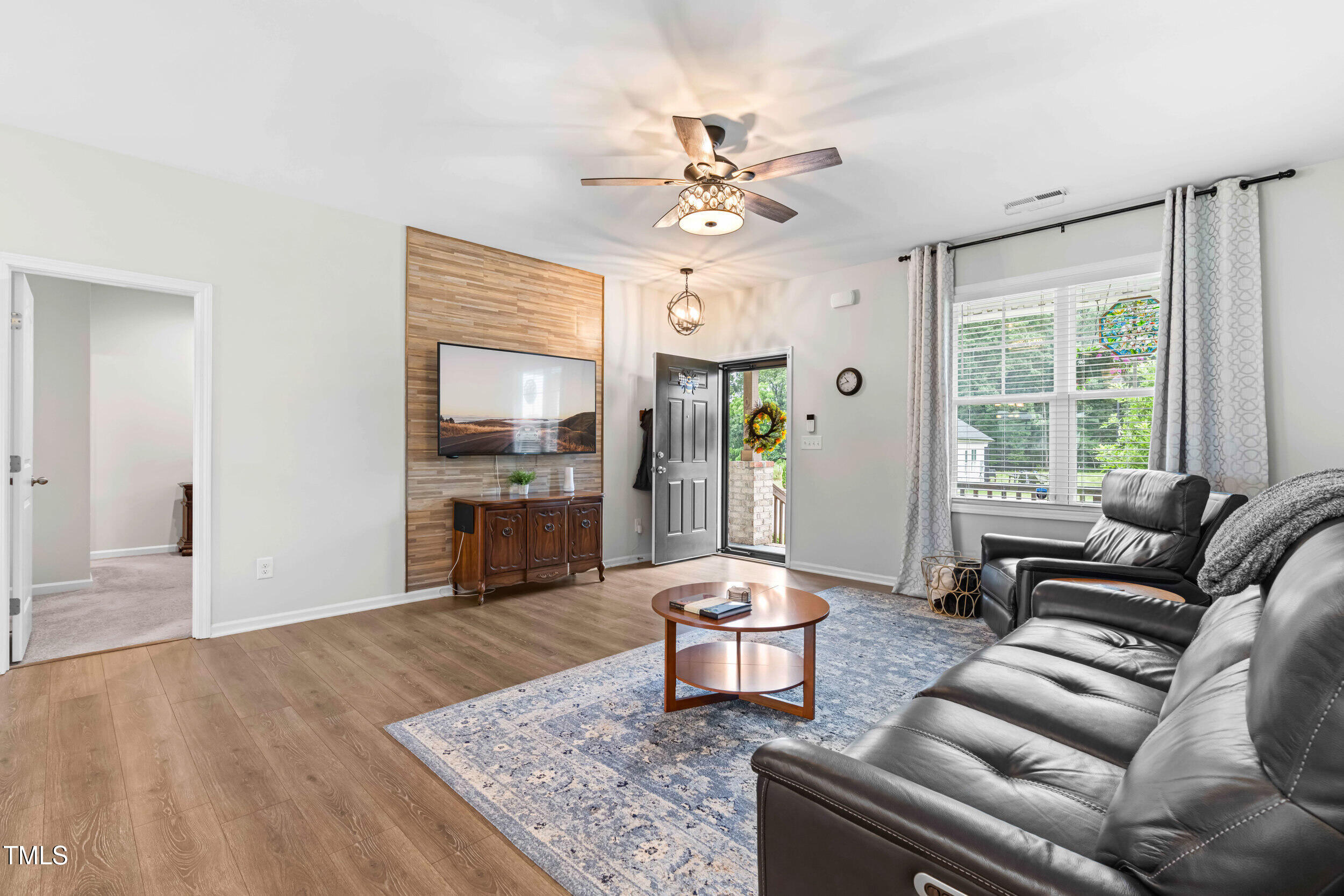 173 Longbow Drive Middlesex, NC 27557 - Photo 13 of 32 a living room with furniture and a large window