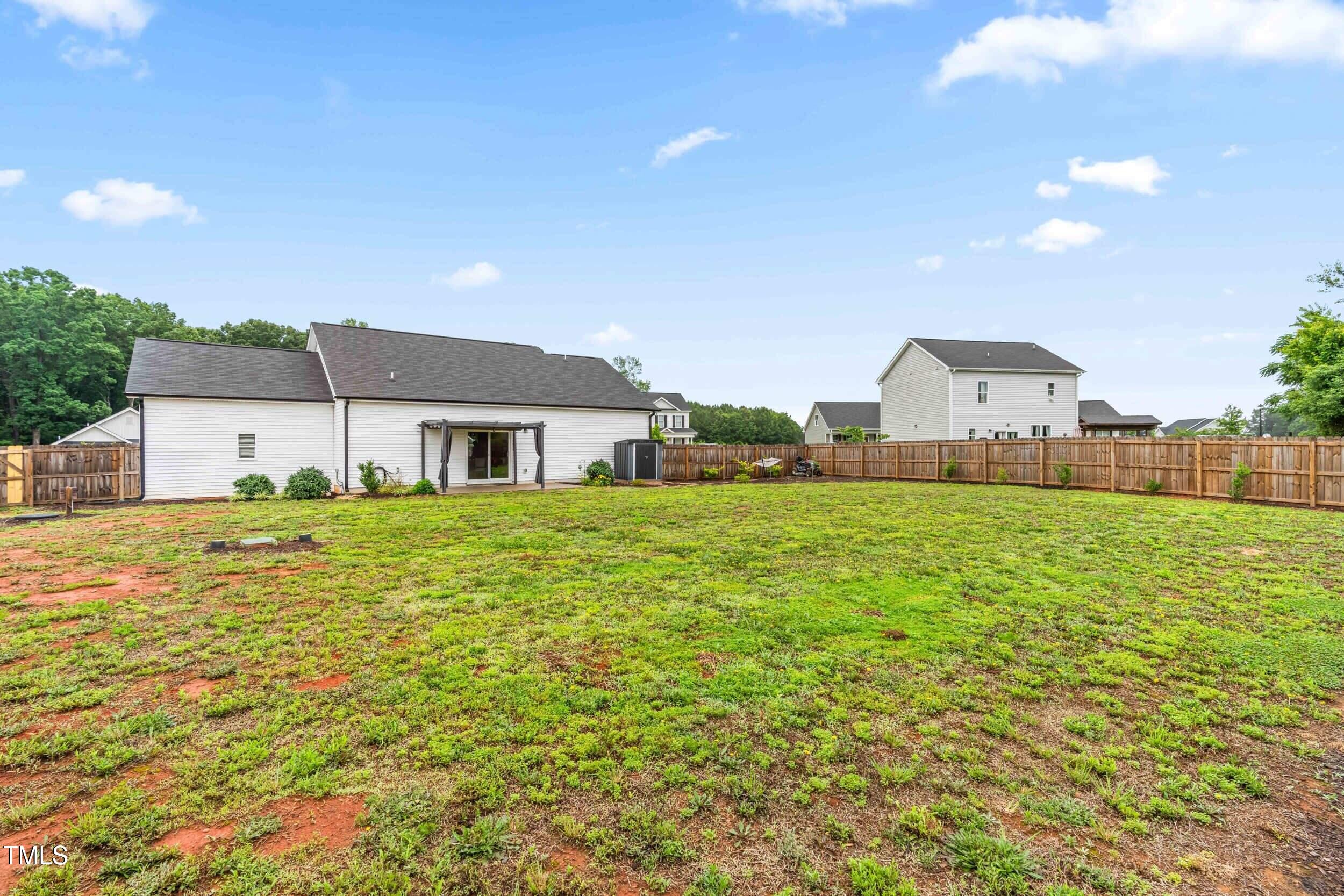 173 Longbow Drive Middlesex, NC 27557 - Photo 29 of 32 a front view of a house with garden