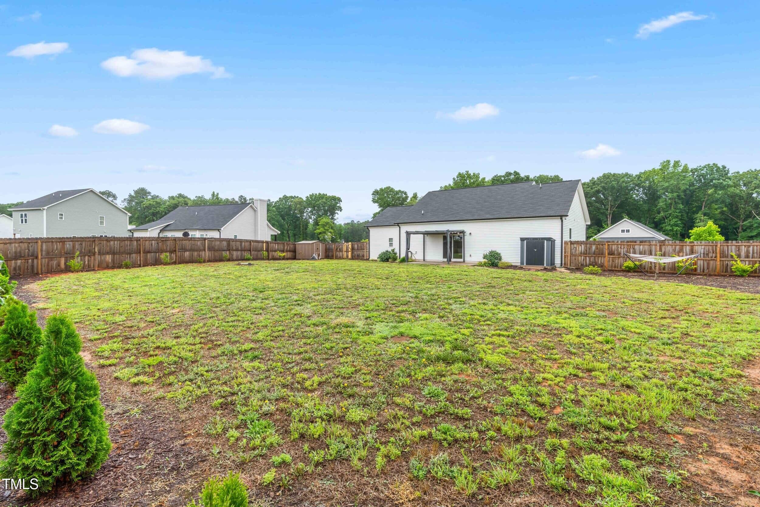 173 Longbow Drive Middlesex, NC 27557 - Photo 30 of 32 a house view with swimming pool and mountain view