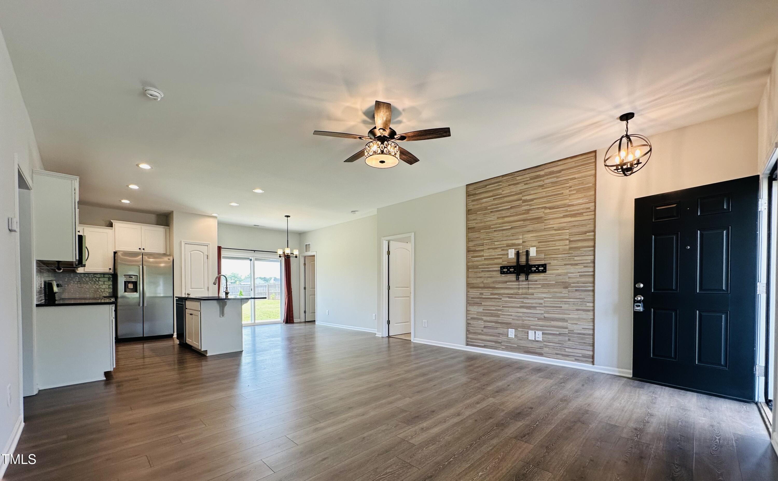173 Longbow Drive Middlesex, NC 27557 - Photo 7 of 32 a view of a kitchen with a sink and a refrigerator