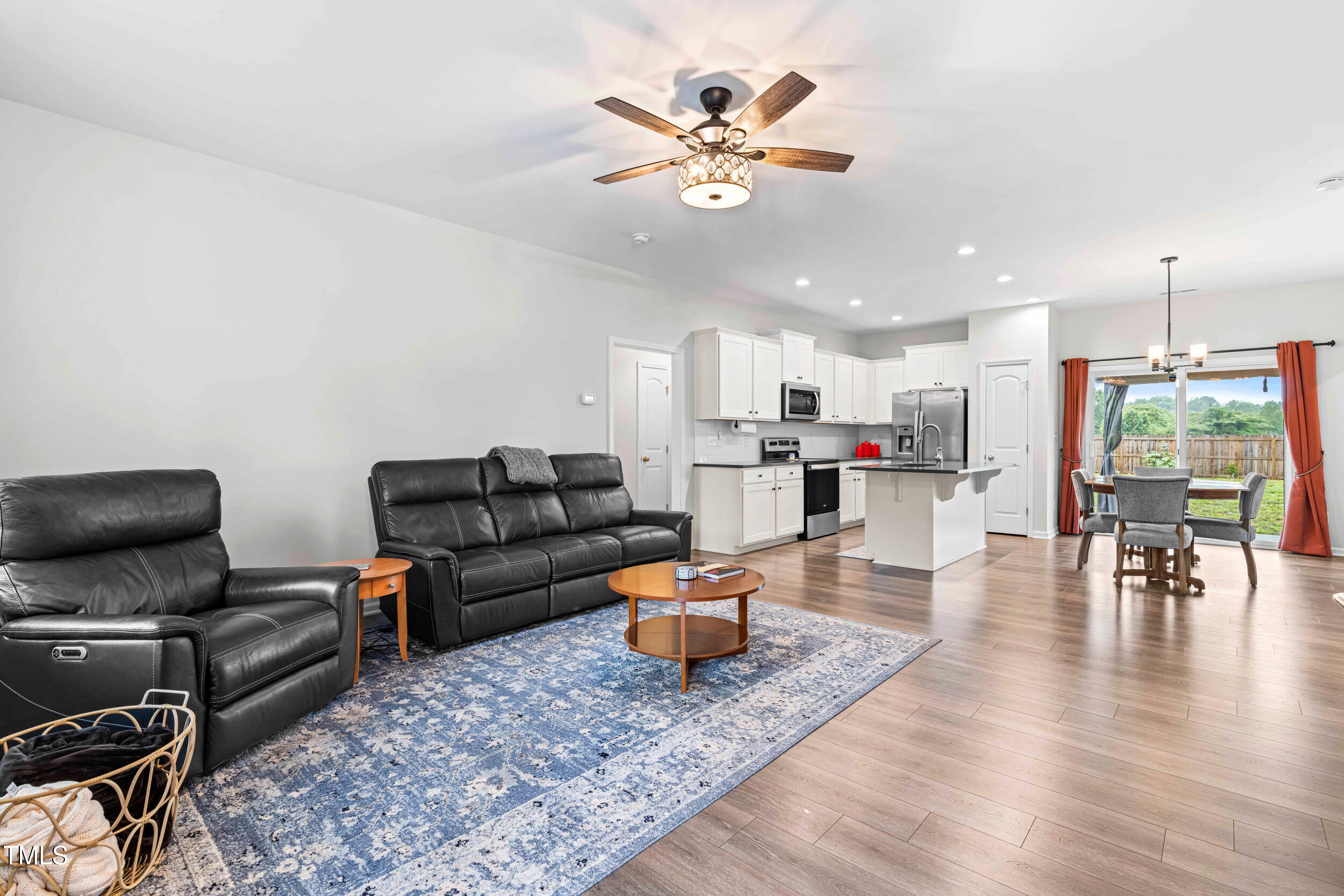 173 Longbow Drive Middlesex, NC 27557 - Photo 8 of 32 a living room with furniture and kitchen view