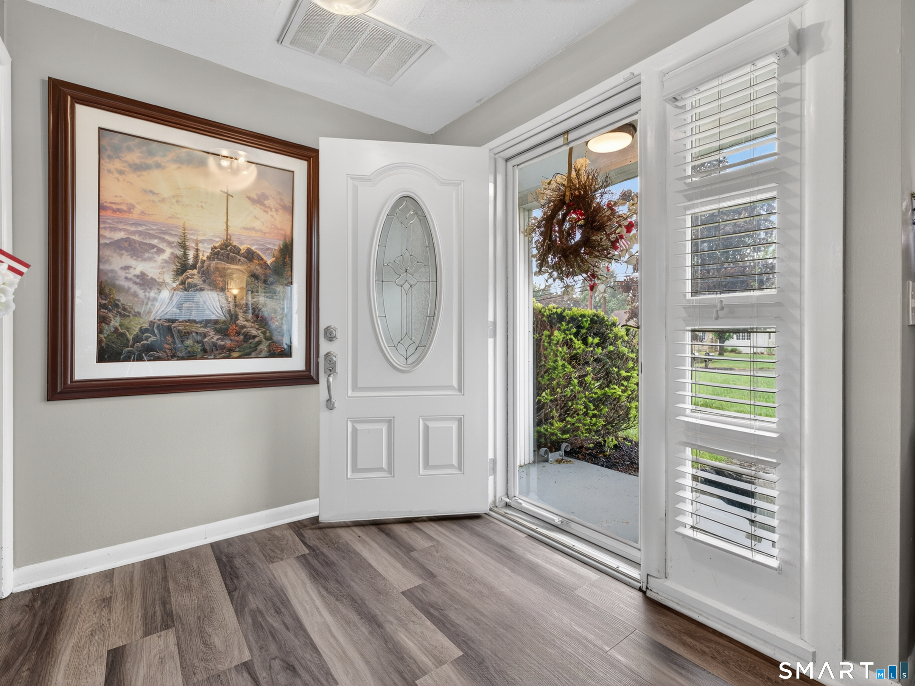 235 Scotland Road Norwich, CT 06360 - Photo 15 of 31 a view of front door with wooden floor