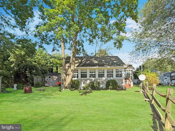 a view of a house with a garden