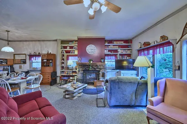 a bed room with a bed and a chair