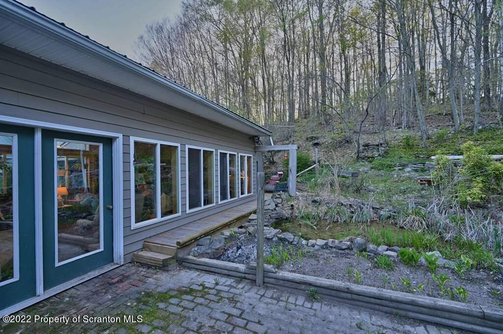 69-71 Timbertop Trail Newfoundland, PA 18445 - Photo 116 of 137 a view of a house with backyard and garden