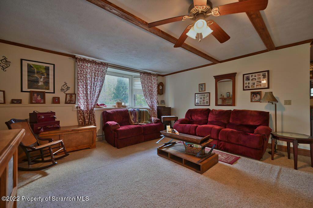 69-71 Timbertop Trail Newfoundland, PA 18445 - Photo 70 of 137 a living room with furniture and a large window