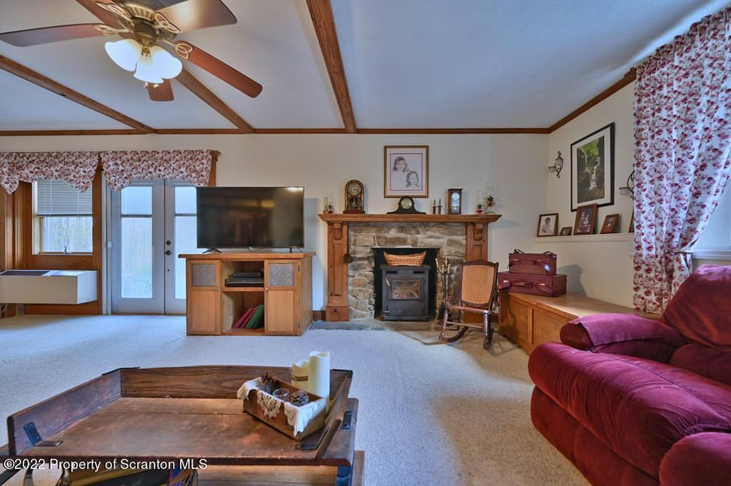 69-71 Timbertop Trail Newfoundland, PA 18445 - Photo 71 of 137 a living room with furniture and a fireplace