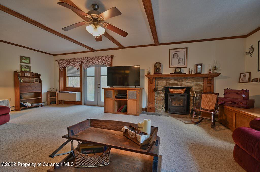 69-71 Timbertop Trail Newfoundland, PA 18445 - Photo 72 of 137 a living room with furniture and a fireplace