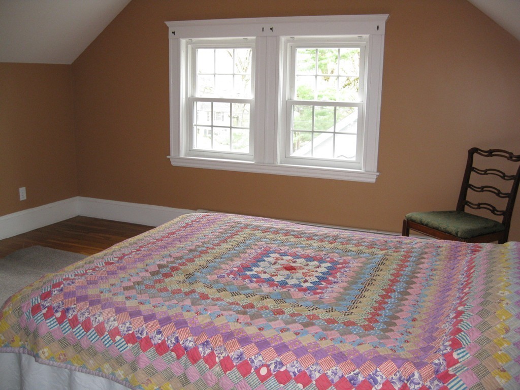 134 Hillcrest Road Needham, MA 02492 - Photo 15 of 22 a bedroom with a bed and a window