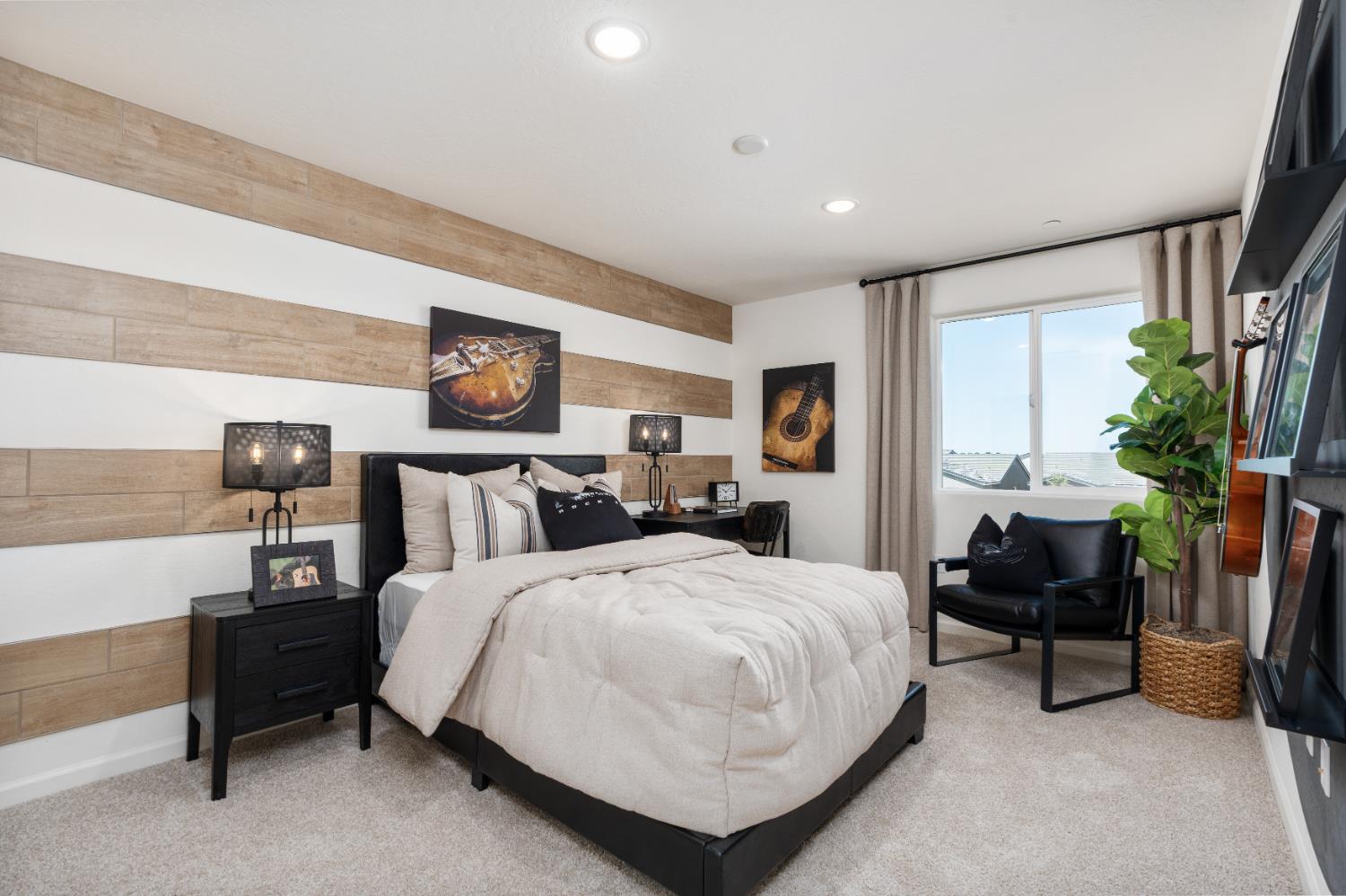 1472 Redbrick Lane Clovis, CA 93619 - Photo 18 of 33 a spacious bedroom with a bed a table and potted plant on the dresser