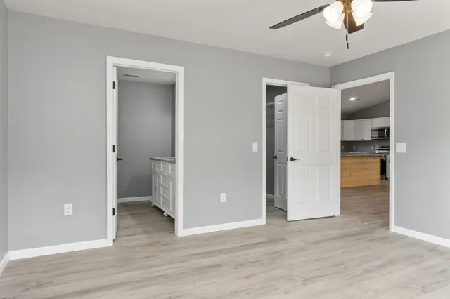 a view of an empty room with a window