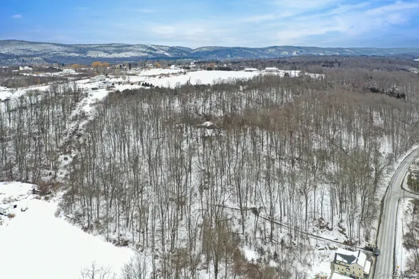 a view of lake with mountain