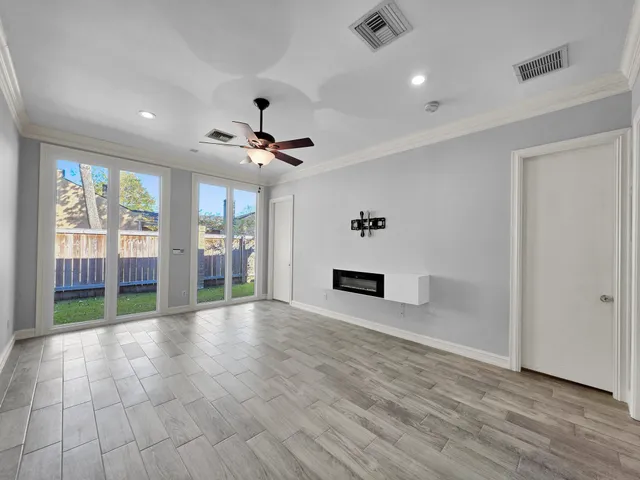 a large kitchen with cabinets