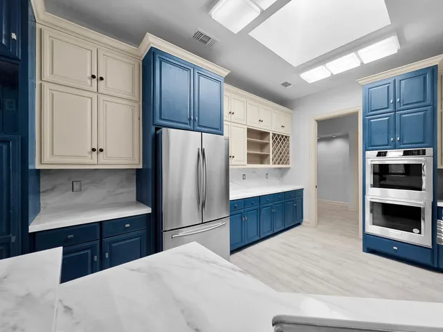 a view of a room with wooden floor and closet
