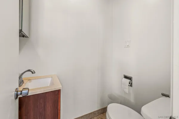 a living room with fireplace furniture and a flat screen tv