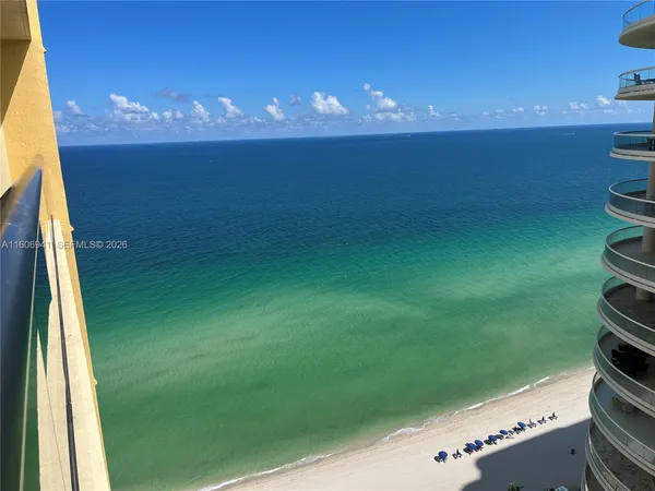 a view of an ocean from a balcony