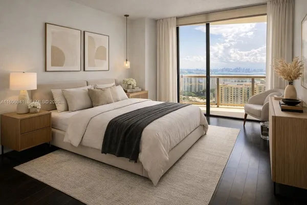 a bedroom with a bed and a large window