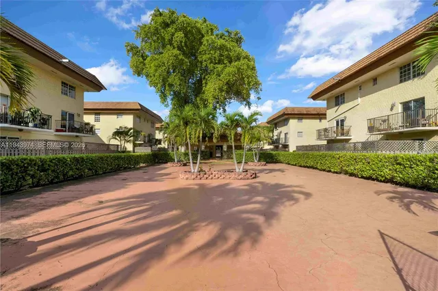 a view of a building with a street