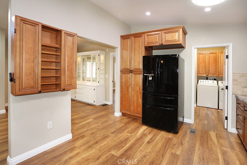 61 Saddleback Road Tustin, CA 92780 - Photo 13 of 49 a view of wooden floor and windows in a room