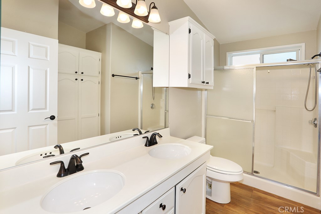 61 Saddleback Road Tustin, CA 92780 - Photo 22 of 49 a bathroom with a sink toilet and shower